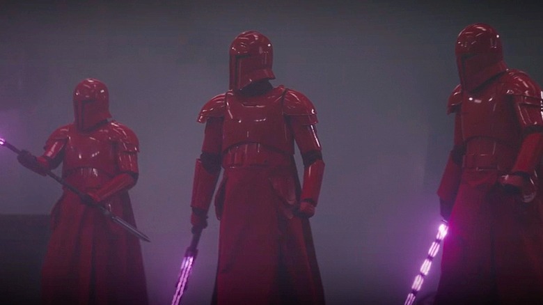 Praetorian Guards brandish their weapons 