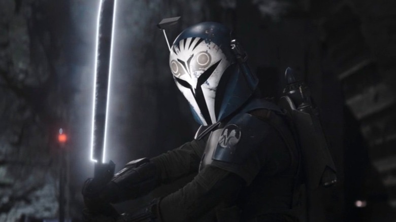 Bo-Katan holding the Darksaber