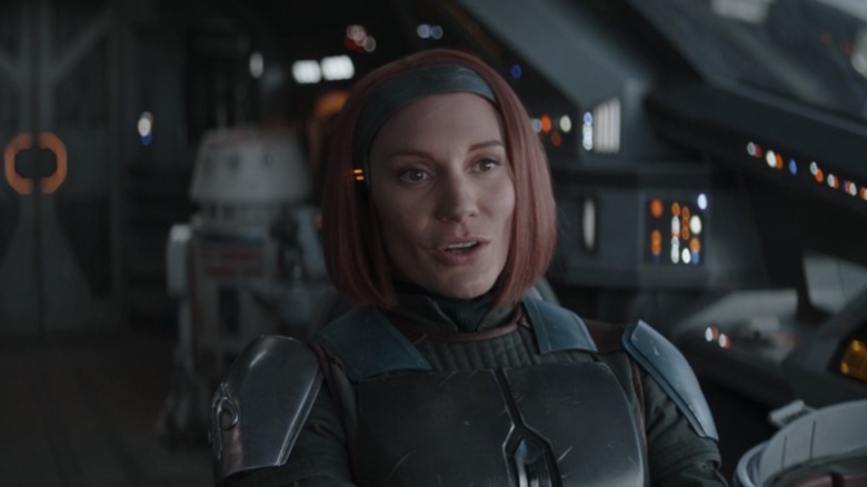 Bo Katan in spacecraft looking forward