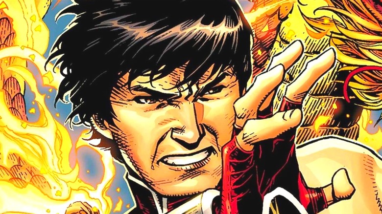 Shang-Chi standing in fire