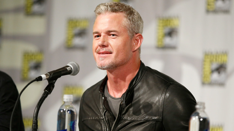 Eric Dane at a microphone at Comic Con
