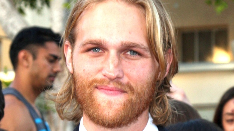 Wyatt Russell smiling politely