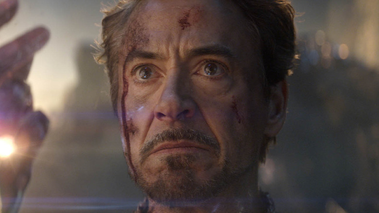 Robert Downey Jr. as Iron Man looking determined
