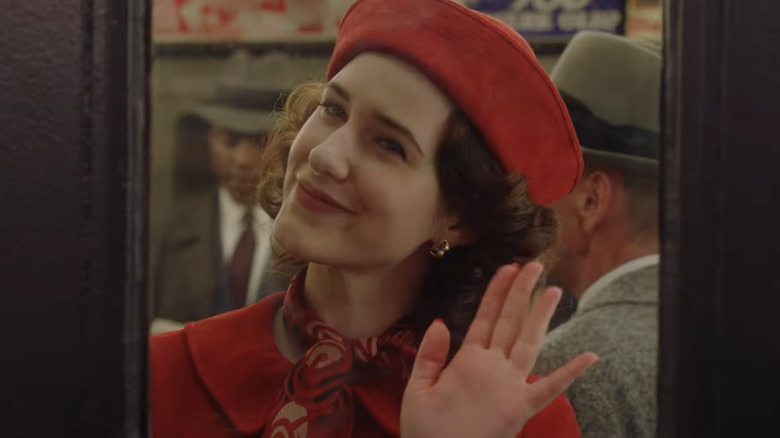 Rachel Brosnahan waving Mrs. Maisel