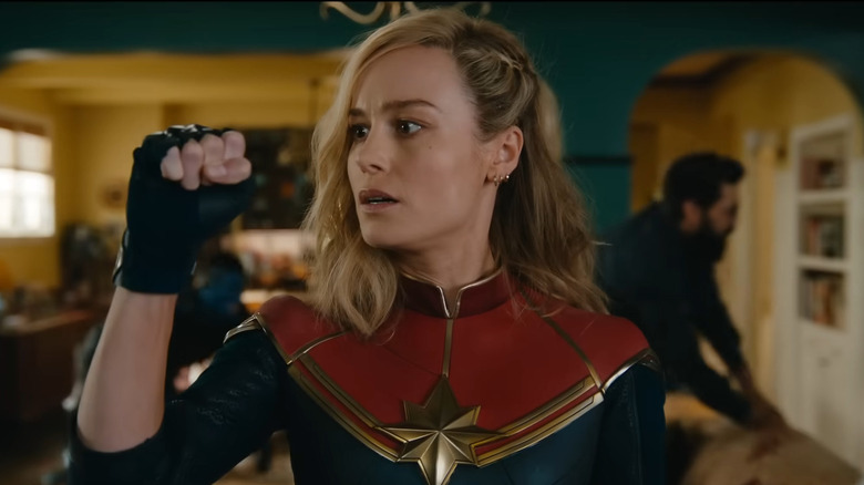 Carol clenching her fist
