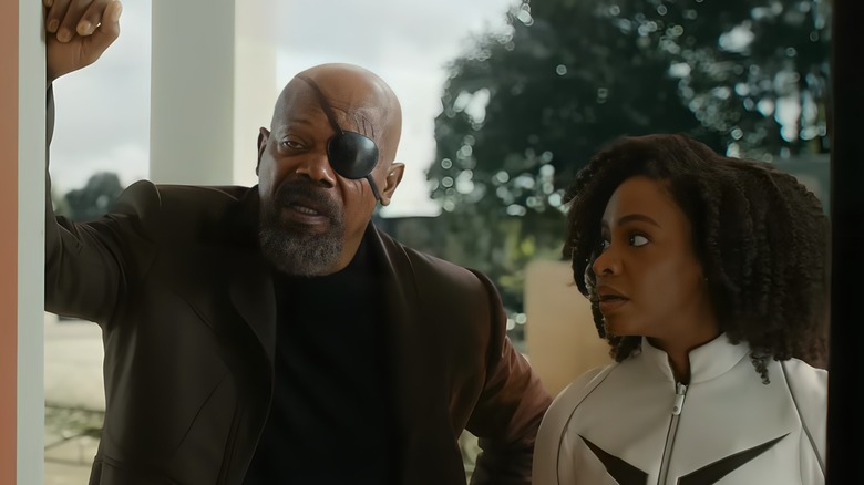 Monica looking at Nick Fury