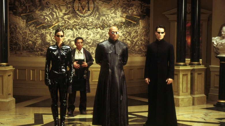 Neo, Morpheus and Trinity visit the Merovingian in 'The Matrix Reloaded' (2003)