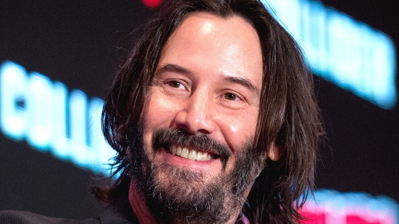 Keanu Reeves smiling