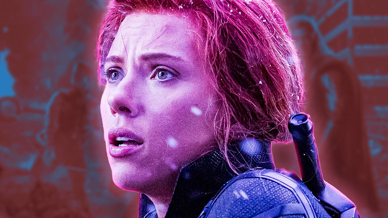 Black Widow looking concerned against a red and blue backdrop