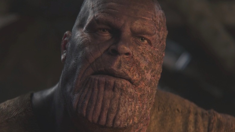 Thanos with a half-burned face