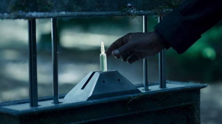 Nick Fury reaching for the Harvest vial