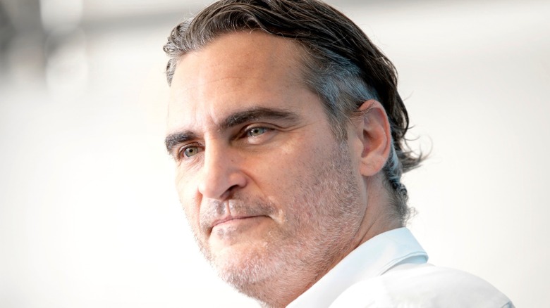 Joaquin Phoenix looking to his right