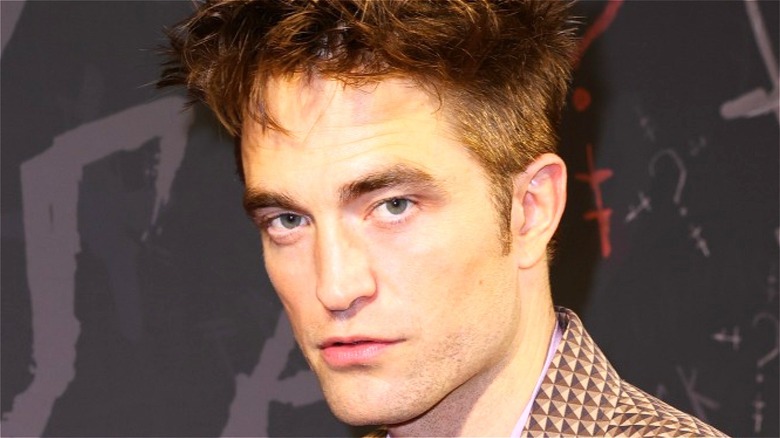 Robert Pattinson posing