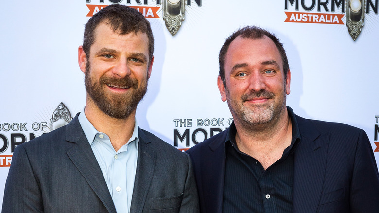 Trey Parker and Matt Stone smile 