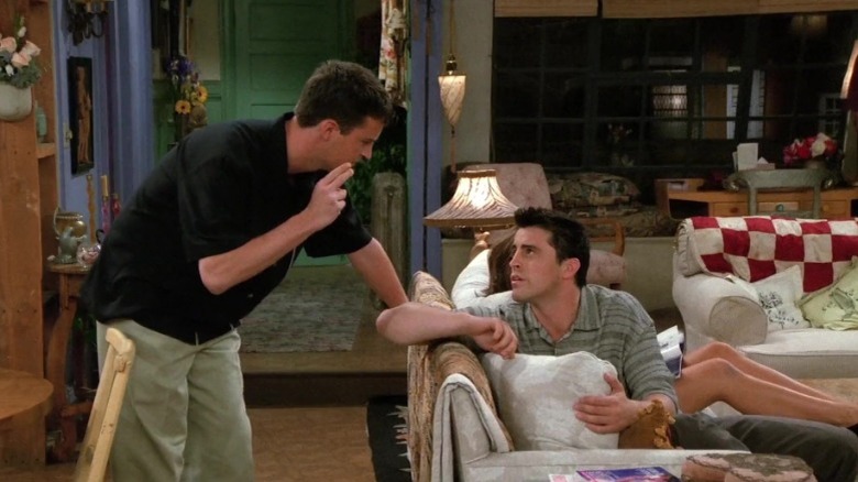 Chandler leans in to insult Joey