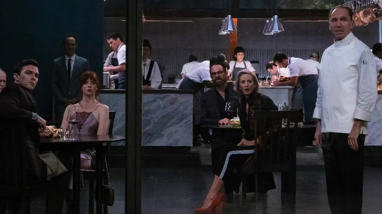 Everyone looking outside the restaurant