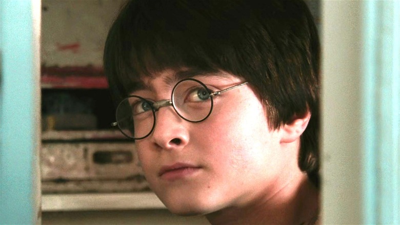 Harry Potter stares thoughtfully