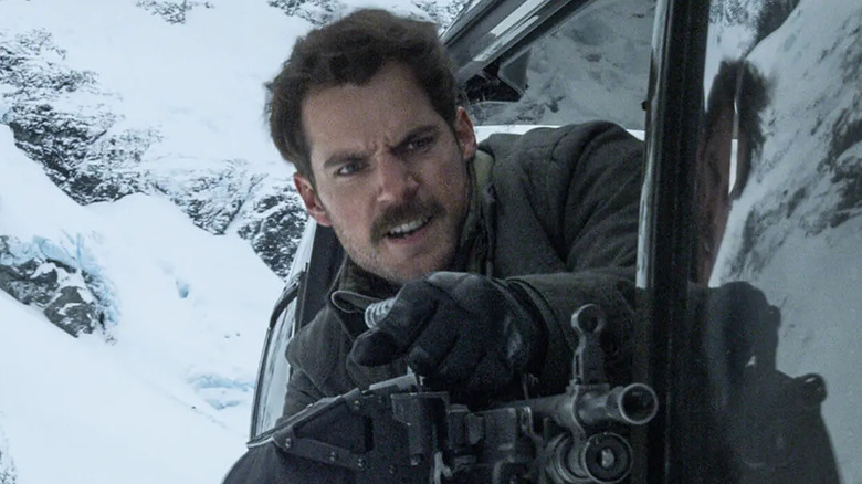 Walker fires from his helicopter