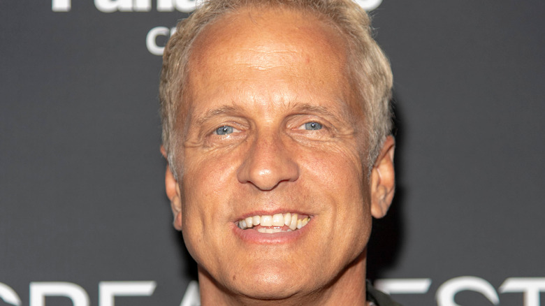 Patrick Fabian smiles at a premiere