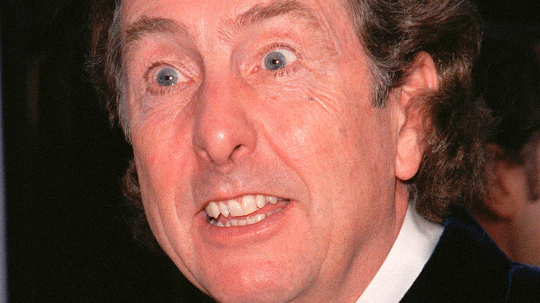 Monty Python's Eric Idle wide-eyed