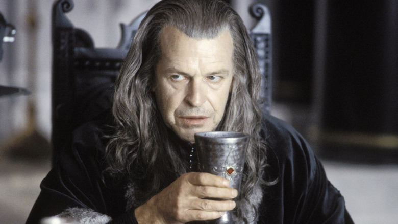 Denethor looks up over cup