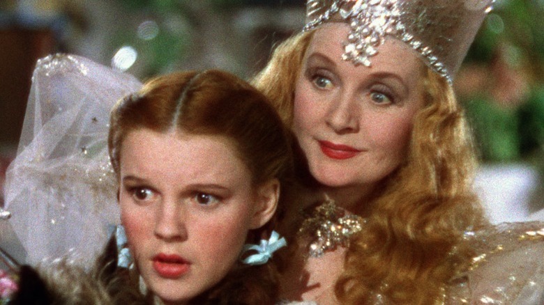 Glinda holding Dorothy