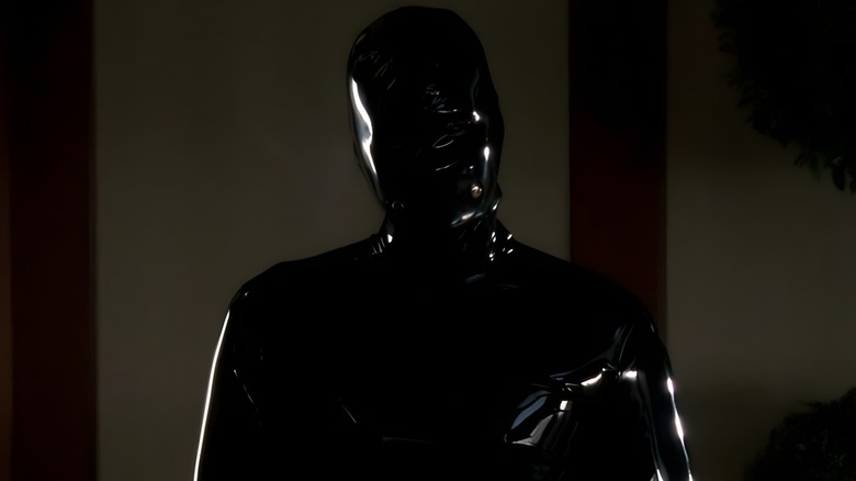 Rubber Man with head cocked