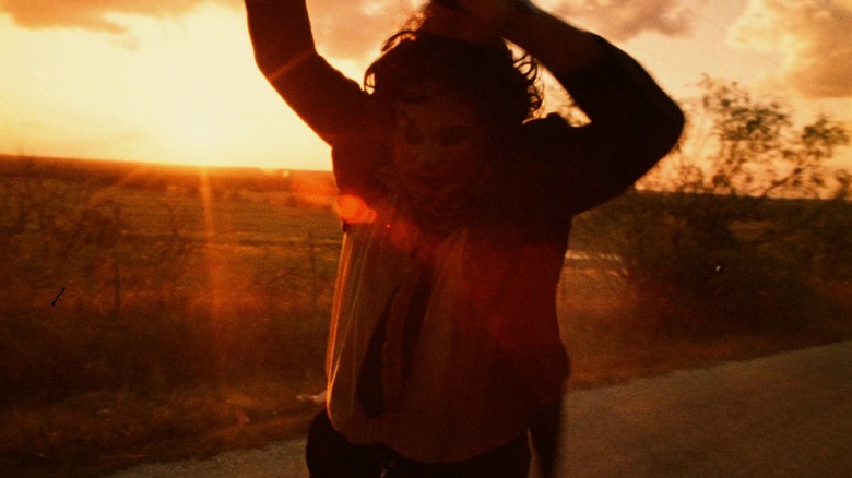 Leatherface swings his chain saw