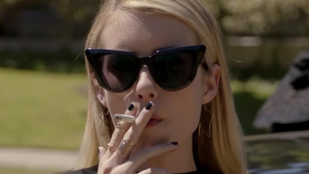 Madison Montgomery smoking a cigarette