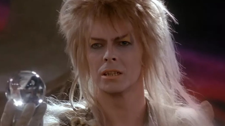 Jareth looks at a crystal ball in "Labyrinth" (1986)