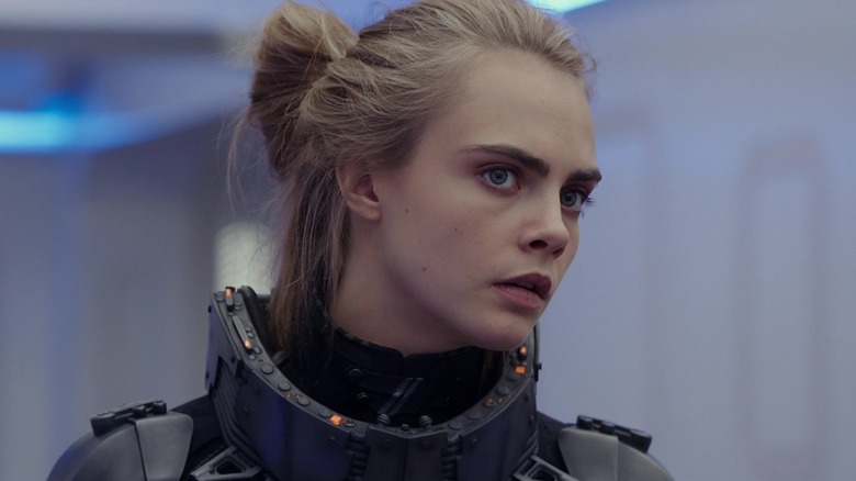 Cara Delevingne staring in body armor in 