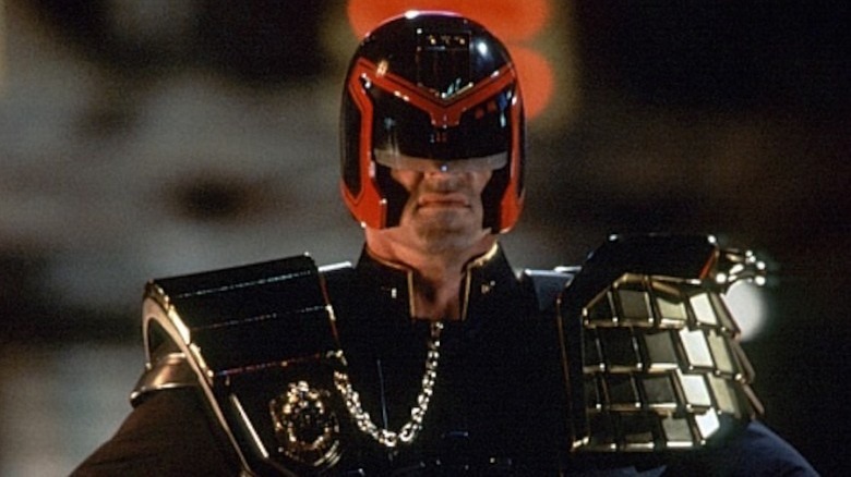 Sylvester Stallone mugging in uniform in "Judge Dredd" (1995)