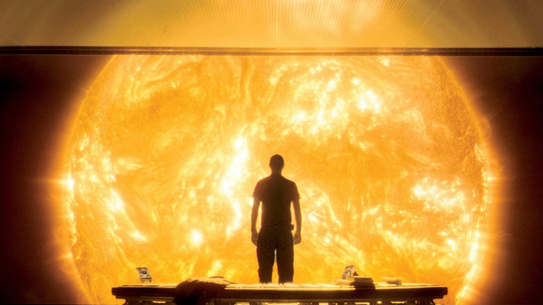 Capa looks at the sun in Sunshine (2007)