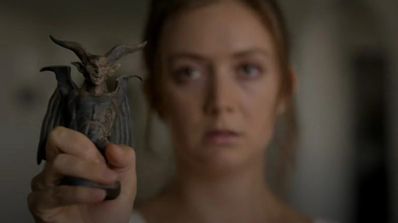 Liv holding the totem