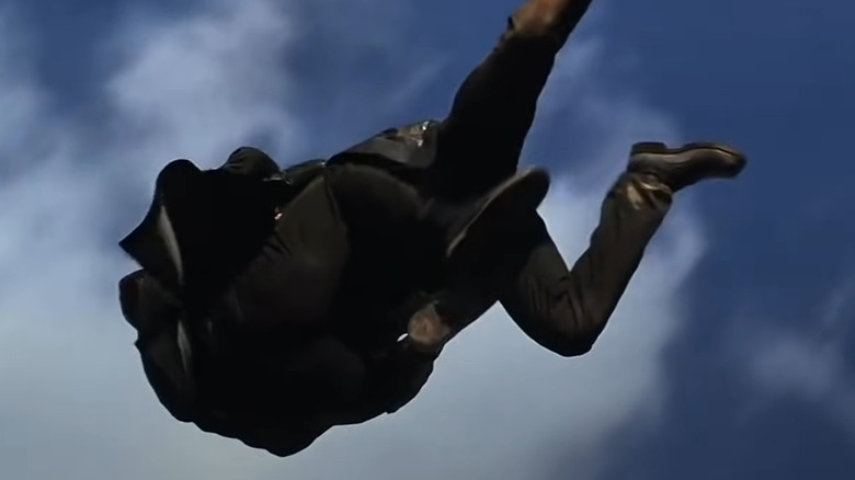 Two men colliding in air