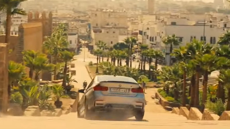 Car driving down staircase