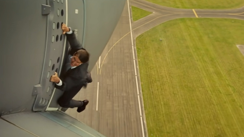 Ethan Hunt hanging from airplane