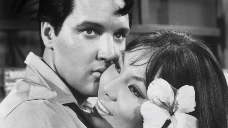 Elvis Presley hugging Irene Tsu