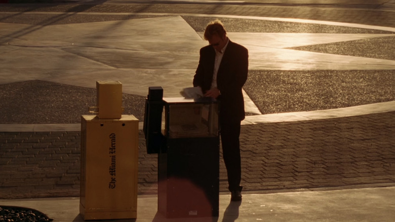 Lieutenant Horatio Caine reading newspaper