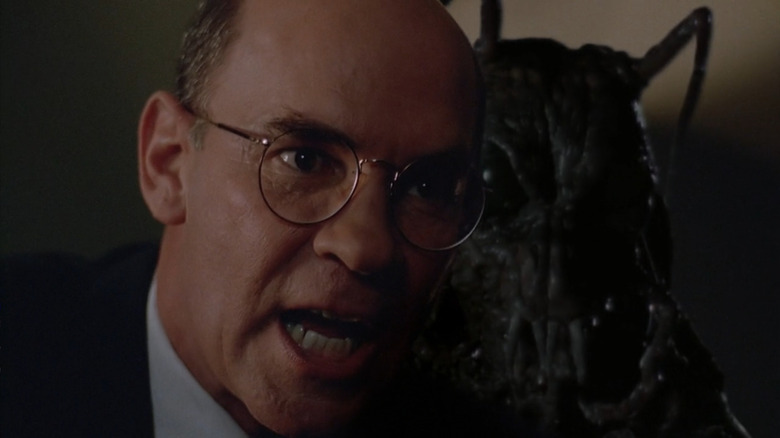 Skinner with giant bug behind him