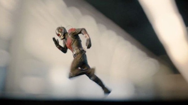 Ant-Man runs across the top of a gun in "Ant-Man" (2015)