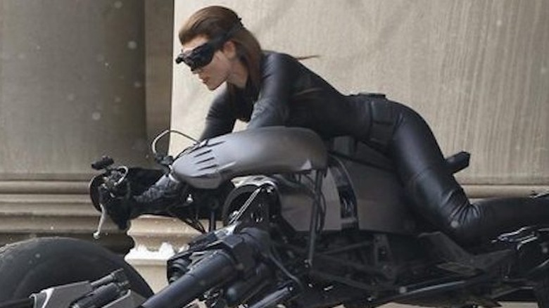 Anne Hathaway on a motorcycle as Catwoman