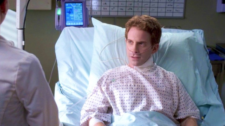 Nick in a hospital bed