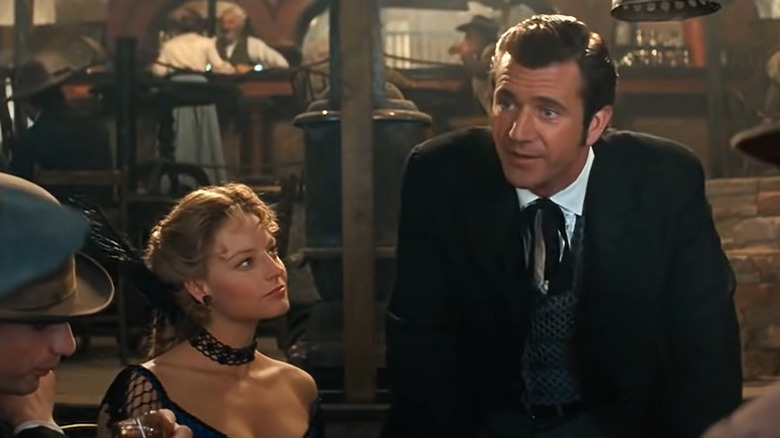 Mel Gibson and Jodie Foster play cards