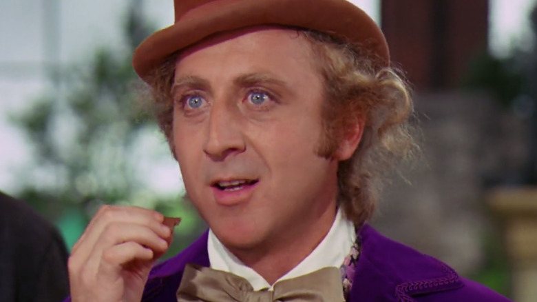 Willy Wonka watches in suspense