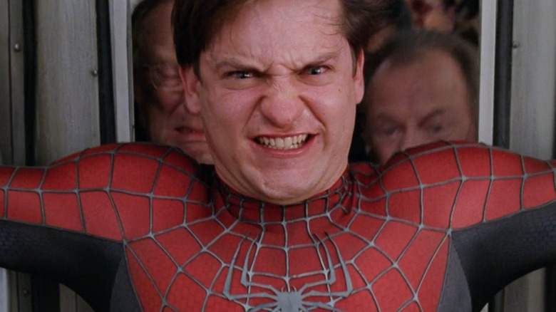 Spider-Man holding train
