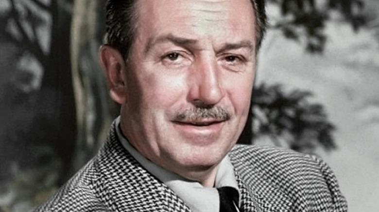 Walt Disney poses in restored black and white