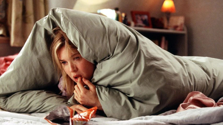 Upset Renee Zellweger hides under blanket