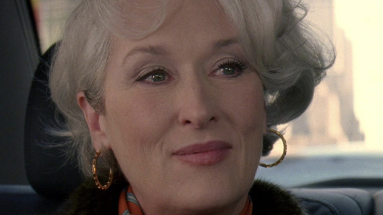 Miranda Priestly half smiles