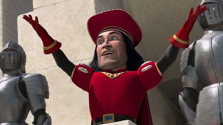 Lord Farquad raises his arms